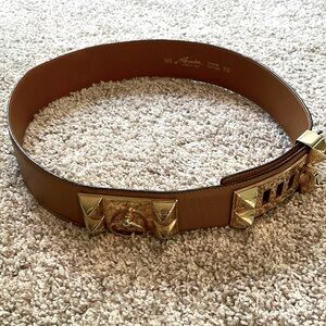 Leather belt made in Italy with gold accents. Size 80 cm